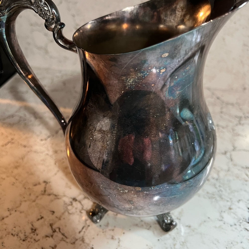 Silver over copper water pitcher 9 inches tall  By Brogers Silver company #370